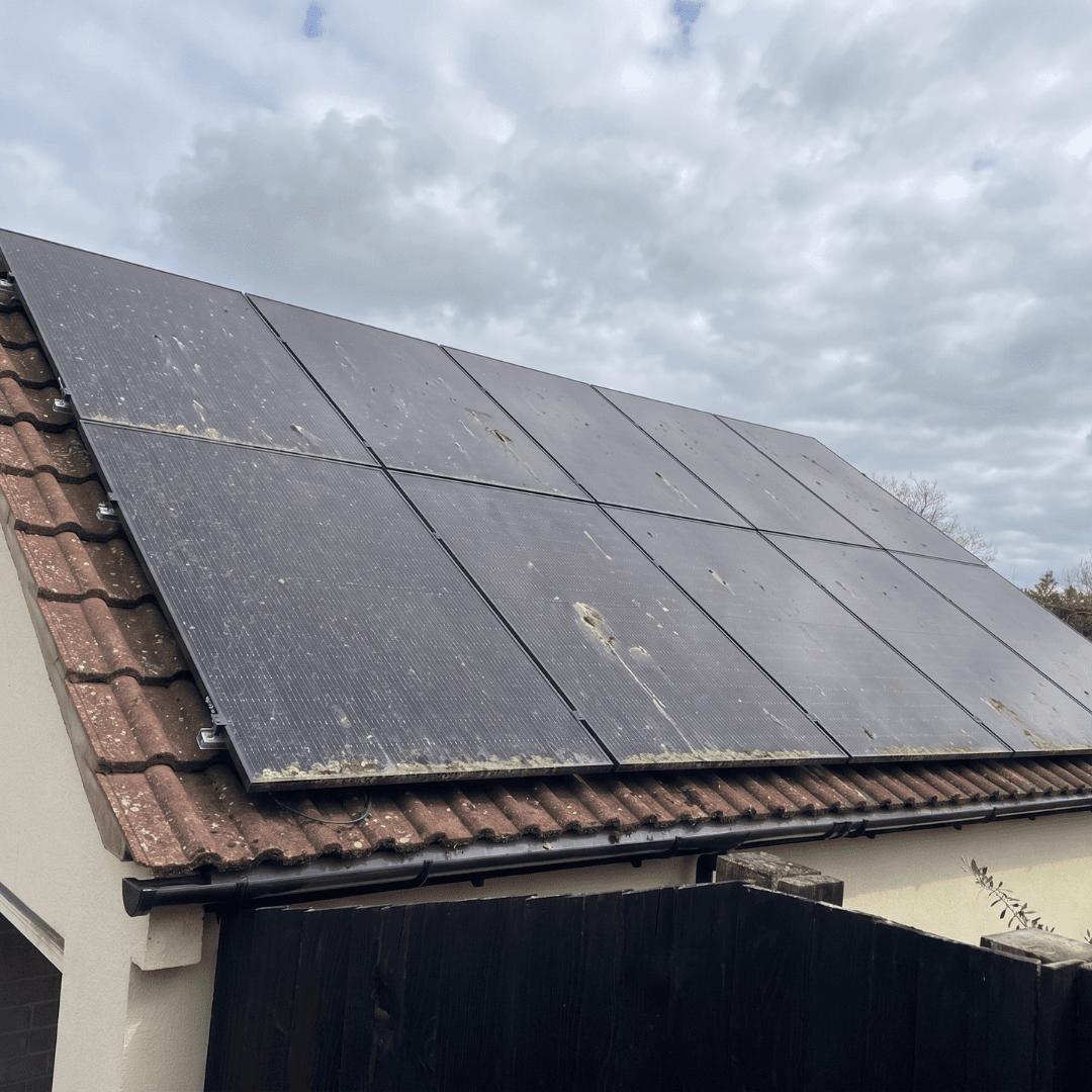 Dirty solar panels before a clean